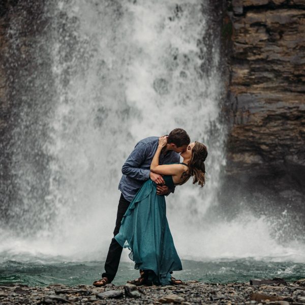 Waterfall engagement photos by Calgary engagement photographer Ashley Daphne Photography